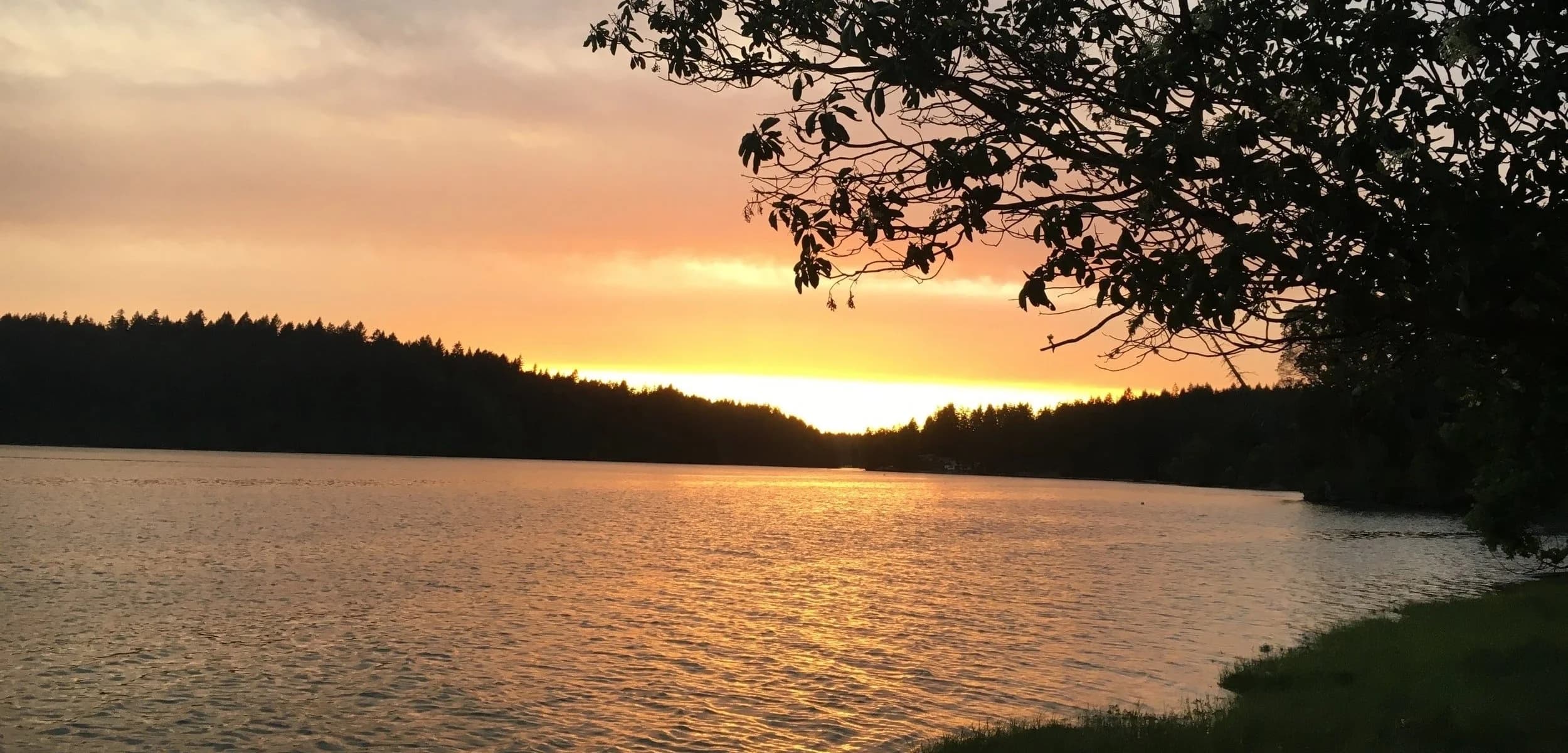 Sunset over a calm lake in the Pacific Northwest